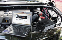 Load image into Gallery viewer, Energizer 500 Watt Power Inverter 12V image of using in car and laptop.
