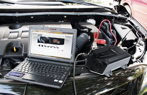 Energizer 500 Watt Power Inverter 12V image of using in car and laptop.